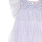 Bringing a hint of Hollywood glamour, the Tutu du Monde Girls’ Ziegfeld Tulle Dress showcases a lavender tulle construction with ruffled sleeves, sequin-adorned bodice, and a beautifully layered skirt.