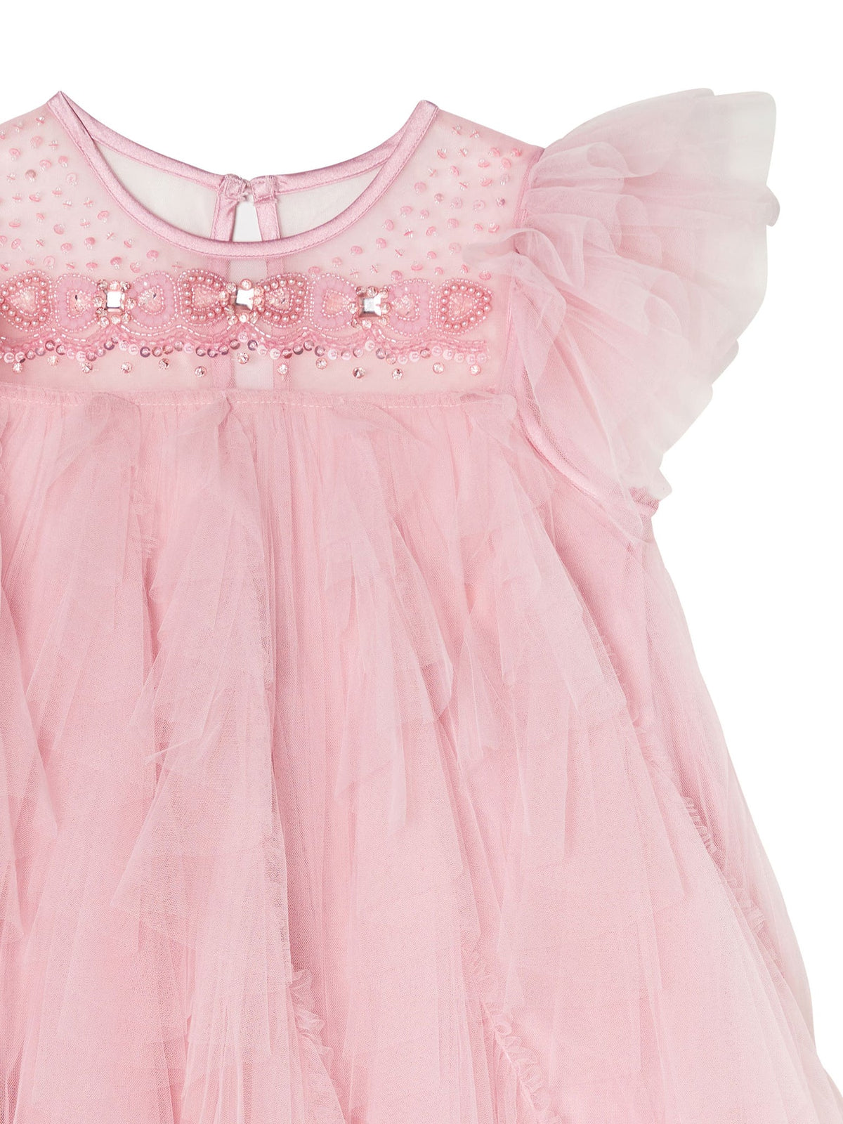 Close-up of the Tutu du Monde Summit Sparkle Tulle Dress, featuring pink tulle, ruffled sleeves, beaded accents, and a sheer overlay for a winter fairytale vibe.