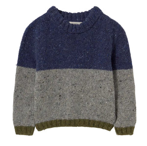 The Cozmo Baby Boys’ Tigris Knit Sweater features a color-block design with navy blue on the upper half, light gray on the lower half, and olive green accents at the cuffs, hem, and collar. Crafted from lightweight wool, this cozy sweater combines warmth and style for your little one.