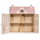 Discover the Alouette House by Tender Leaf Toys—a delightful plywood dolls house featuring a charming pink roof, open front doors, visible stairs, and three inviting rooms across two floors. The interior walls are beautifully adorned with a delicate light floral pattern, adding extra elegance to every play session.