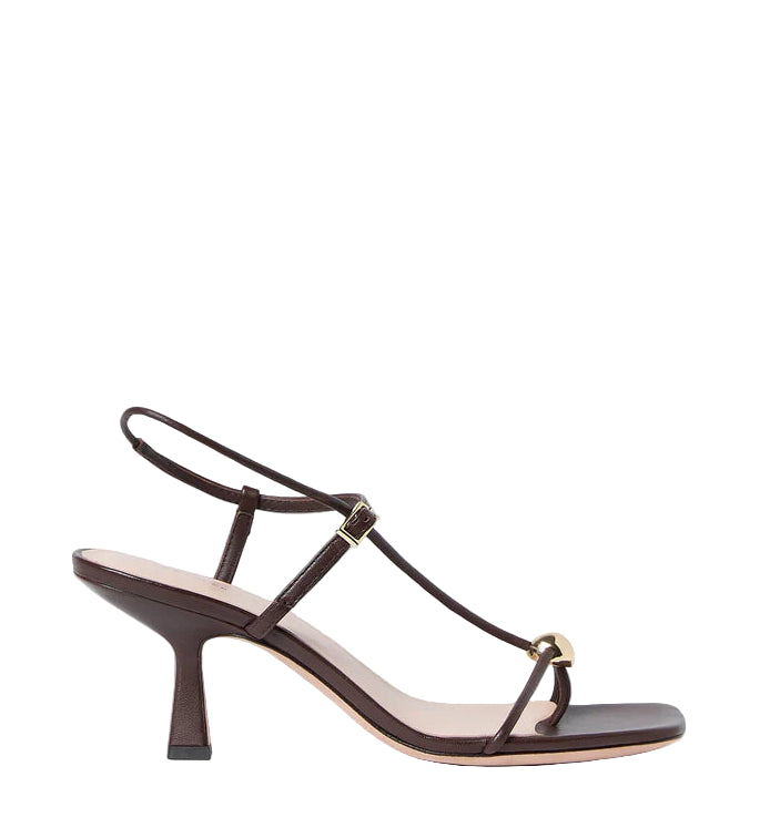 The Loeffler Randall Triana Mid Heel Sandal features brown nappa leather, thin straps, a small buckle, and a square toe, displayed in side profile against a white background.
