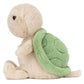 The Jellycat Thimble Turtle is a plush toy with a beige body and green shell, perfect for curious kids. Shown in side profile against a white background.