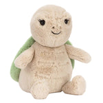 The Jellycat Thimble Turtle is a plush toy with a light beige body, stitched smile and eyes, and a soft green shell. Sitting upright against a white background, it's the perfect companion for curious-minded adventures.