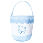 The Bits & Bows "It's a Boy Tote" is a white and light blue fabric tote with a handle, featuring "It's a Boy!" and a rattle graphic on the front—an ideal sustainable gift for welcoming a baby boy.