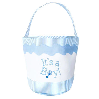 The Bits & Bows "It's a Boy Tote" is a white and light blue fabric tote with a handle, featuring "It's a Boy!" and a rattle graphic on the front—an ideal sustainable gift for welcoming a baby boy.