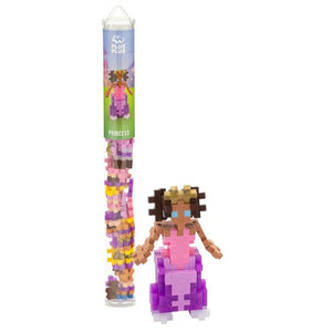 A Plus Plus Tube - Princess sits next to a princess figure built from its colorful pieces—ideal for creative play and enhancing fine motor skills.