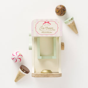 A sustainable wooden ice cream maker toy for kids, complete with ice cream cones.