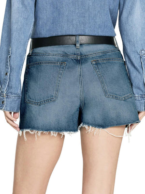 Woman's back wearing Frame The Vintage Relaxed Raw Fray Short sustainable denim shorts and a denim jacket, focusing on the shorts with visible back pockets and a black belt.