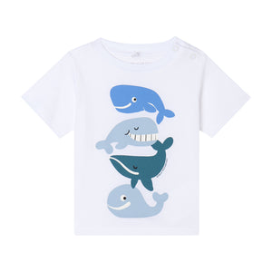 The Stella McCartney Kids Baby Boys' Multi Colored Whale T-Shirt features four cartoon whales stacked vertically in varying blue shades and includes two small shoulder buttons.