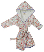 The Timo & Violet Kids' Bathrobe features a Coral Reef motif with pink and coral floral branches, purple trim, and a matching belt. Made from ultra-soft velour cotton terry for cozy comfort.