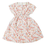 The Delphine Dress by Timo & Violet is a playful summer dress for baby girls and girls featuring short sleeves, organic cotton, and a vibrant Rosy Coral Reef print with a gathered waist and round neckline.