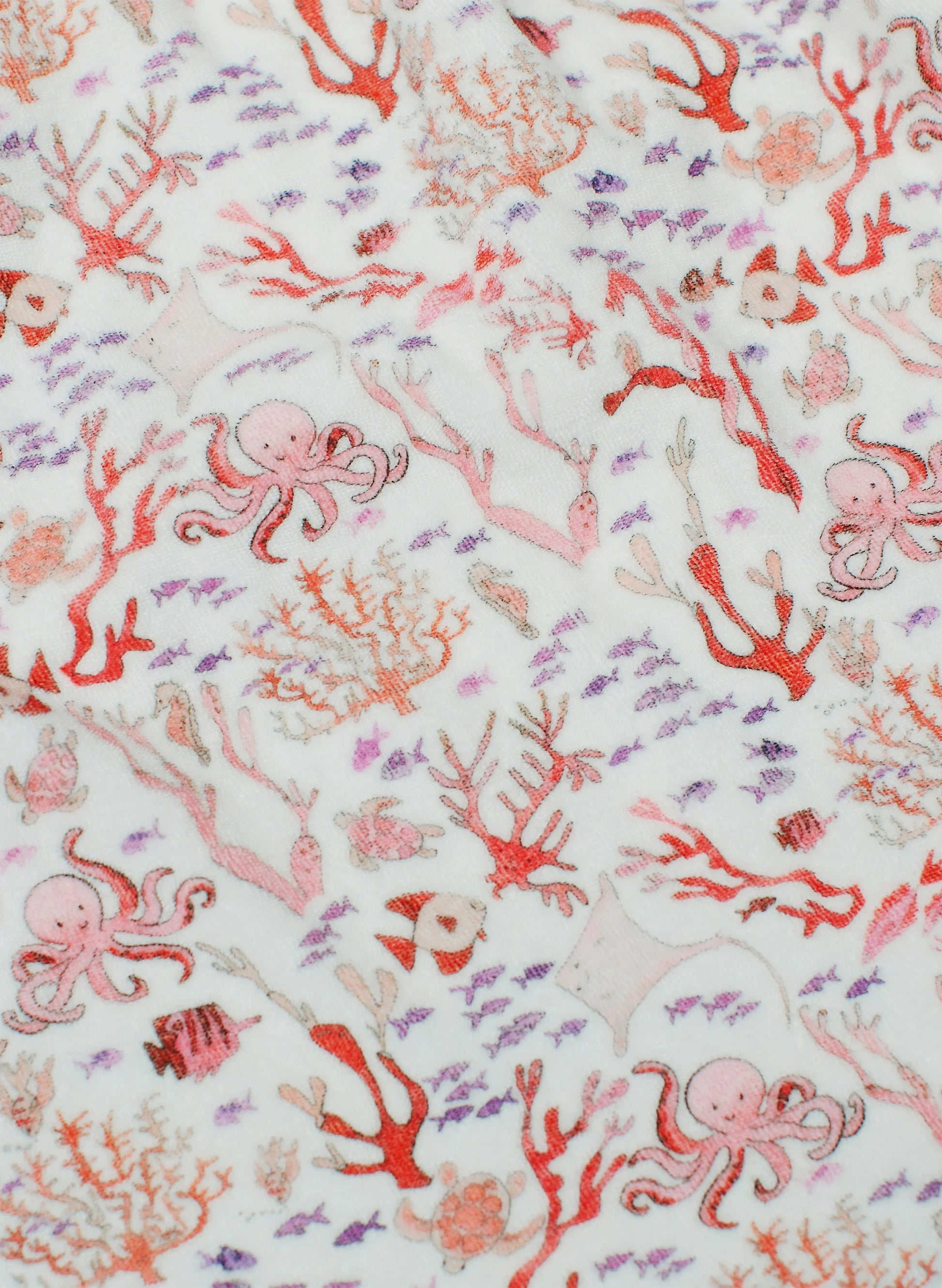 Timo & Violet’s Baby Girls' and Girls' The Delphine Dress features white fabric with Rosy Coral Reef print—red coral, pink octopuses, and purple fish—perfect for a vibrant summer look.