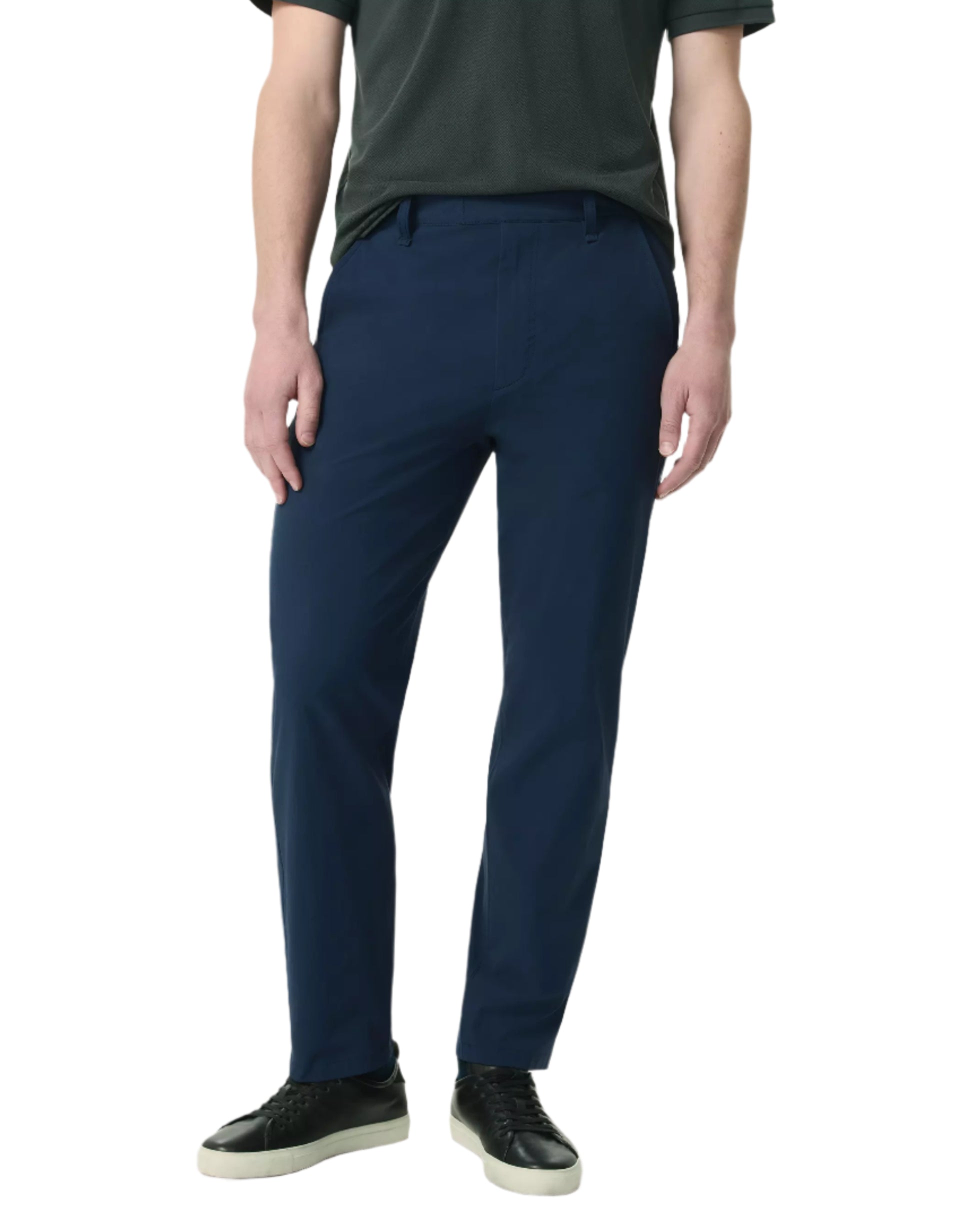 A person in a dark short-sleeve shirt, Rag & Bone Tapered Nylon-Blend Trouser (classic fit, navy), and black sneakers stands against a plain background.