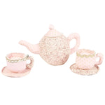 The Mon Ami Floral Stuffed Toy Tea Set includes a pink plush teapot and two teacups with saucers, all adorned with glittery patterns and polka dots.