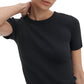 A person stands against a white background, one hand on their neck, wearing the Rag & Bone Essential Ribbed Tee—a true wardrobe staple.