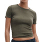 Someone stands against a plain background wearing the Rag & Bone Essential Ribbed Tee in olive green and navy blue drawstring pants—a versatile wardrobe staple.