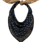 A navy blue and tan reversible paisley jacquard The Wild Rag by Guest in Residence, tied in a knot at the top with the pointed end hanging down.