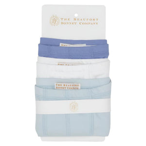 The Beaufort Bonnet Company's Baby Boys' Theodore's Underthings set includes three folded onesies in blue, white, and Park City Periwinkle, packaged together with a branded label.
