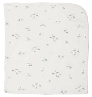 Introducing the Magnetic Me Tiny Diny Blanket: a white stroller blanket adorned with a subtle pattern of small dinosaurs, crafted from GOTS-certified organic cotton to ensure your baby's utmost comfort.