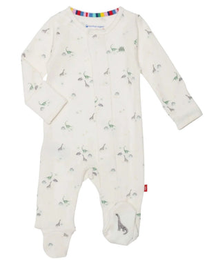 The Magnetic Me Tiny Diny Footie by Magnetic Me is a white infant onesie crafted from GOTS certified organic cotton. It features long sleeves, footed legs, and a charming pattern of small dinosaur illustrations. The neckline is accentuated with colorful striped trim, making it an essential addition to any baby’s wardrobe.