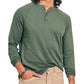 A person wearing a Faherty Long-Sleeved Cloud Henley in green with three buttons and beige pants, shown from shoulders to hips.