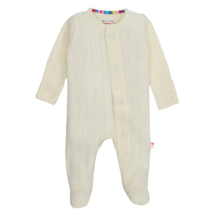 The Magnetic Me Love Lines Pointelle Footie by Magnetic Me is a cream-colored baby onesie made from organic cotton. It features long sleeves, a vertical stripe pattern, convenient magnetic closures, and a footed design for ultimate comfort.