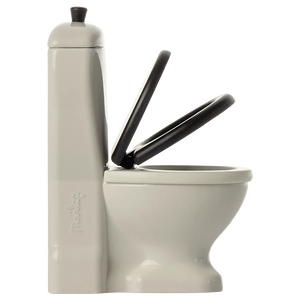 Side view of the Maileg Toilet, Mouse in off-white with a tall rectangular tank, playful handle, and a partially open black seat and lid.