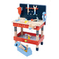 Discover the Tenderleaf Tool Bench by Tender Leaf Toys, a vibrant wooden workbench designed for kids. It comes with an array of tools such as a drill, wrench, hammer, and saw. Below the carpenter tool set is a toolbox filled with extra pieces, making it ideal for young builders honing their skills.