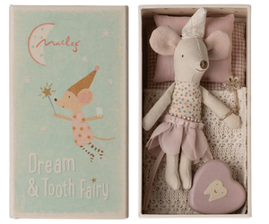 A Maileg Tooth Fairy Mouse, Little Sister in Match Box lies in a box with a small pillow and bedlinen. The lid reads "Maileg Dream & Tooth Fairy" and features an illustration of a mouse with a wand.