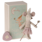 A Maileg Tooth Fairy Mouse, Little Sister in Match Box, stands beside a small book with "Dream & Tooth Fairy" written on the cover. A small heart-shaped tooth box sits nearby, ready for bedtime magic under cozy bedlinen.