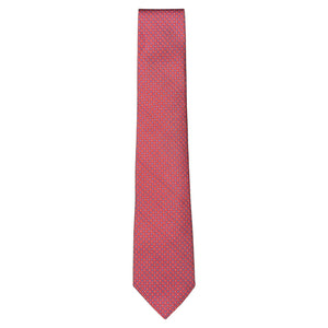 The Robert Jensen Torus Tie is a red silk tie featuring a small blue and white geometric pattern, handmade in Italy and shown against a white background.