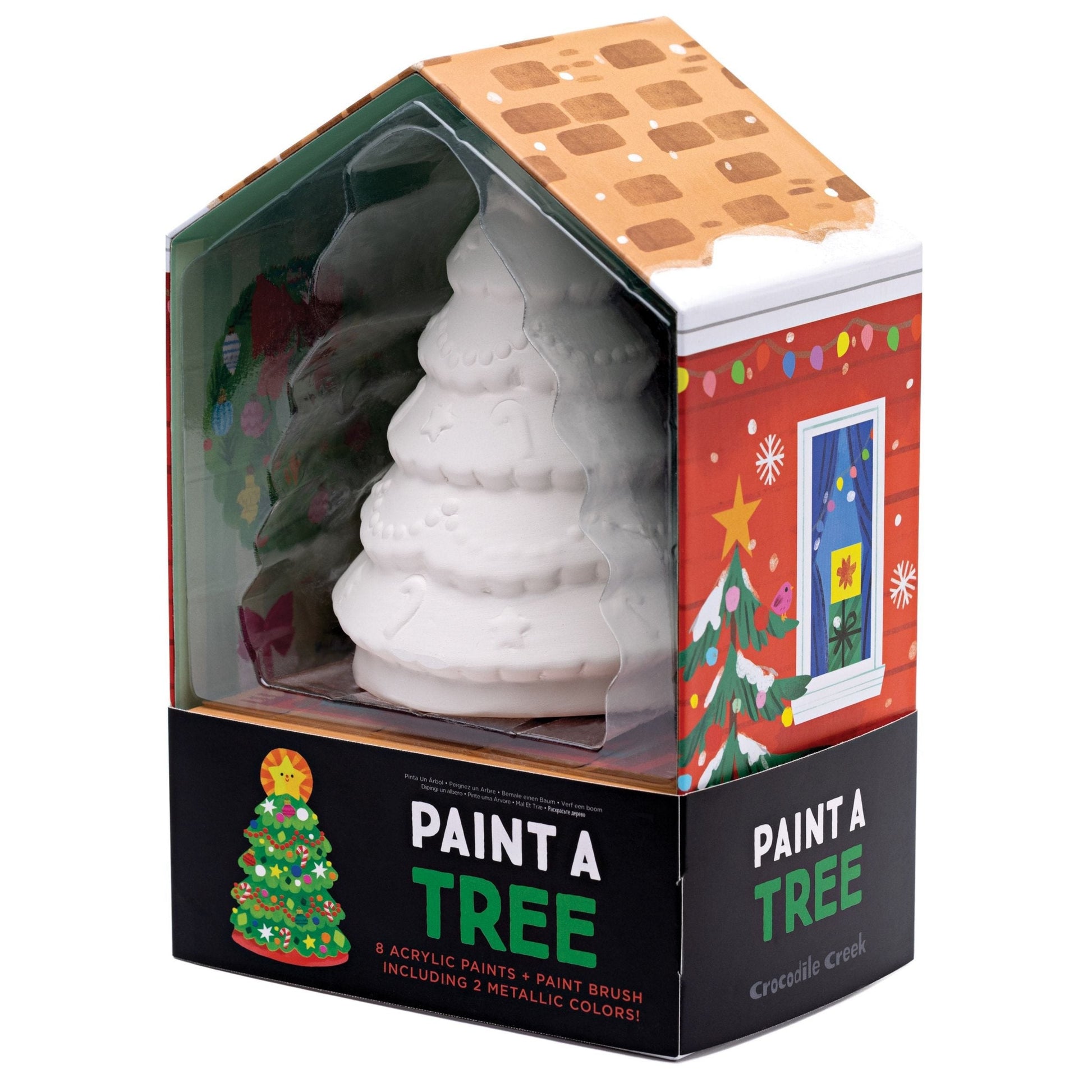 A holiday-themed box encloses the Crocodile Creek Paint a Christmas Tree kit by Crocodile Creek, ideal for crafting personalized Christmas decorations. Inside, you'll discover a beautifully crafted ceramic tree accompanied by vibrant acrylic paints to bring your holiday creation to life.