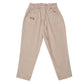 Early Sunday Adrin Trouser in beige with a straight-leg fit and elastic waistband, featuring two back pockets and a small embroidered design on one pocket.