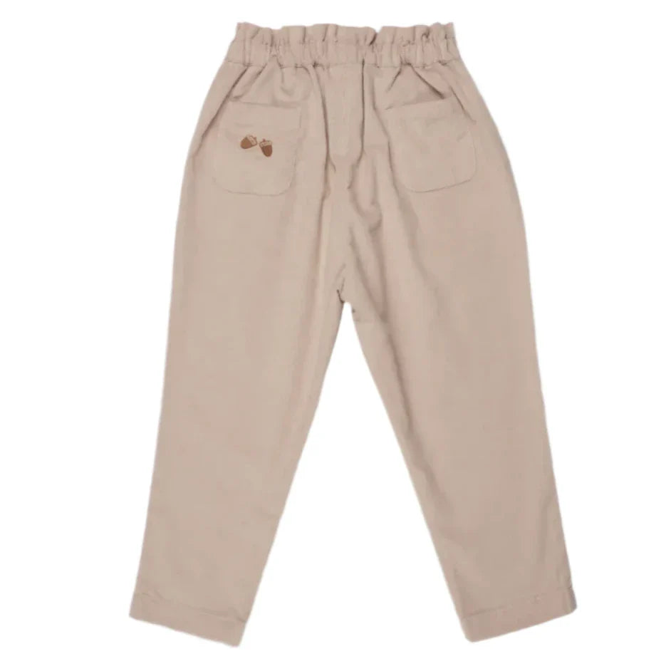 Early Sunday Adrin Trouser in beige with a straight-leg fit and elastic waistband, featuring two back pockets and a small embroidered design on one pocket.