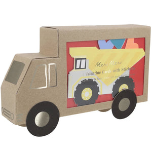 The Meri Meri Truck Kids Valentine's Card Set by Meri Meri features a truck-shaped cardboard box with Valentine cards and fun stickers visible through a side cutout.