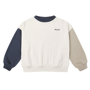 The Boys' Relaxed Sweatshirt by Rylee & Cru features a French terry fabric with navy, beige, and white color-block panels and "PLAY" in small letters on the upper left chest for a subtle athletic touch.