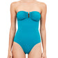 A woman models the Ulla Johnson Monterey Maillot One Piece, a strapless swimsuit with a sweetheart neckline, ruched front, keyhole detail, and full coverage bottom, set against a white background.