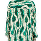 A person is seen from the back wearing the Ulla Johnson Soren Shirt, a long-sleeve, 100% silk garment, featuring a green and cream feather-like pattern.