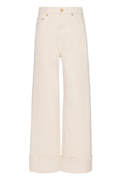 The Genevieve Stretch Jean by Ulla Johnson features wide legs, a high waist, front seams, cuffed hems, belt loops, and front/back pockets in white denim, shown against a plain white background.