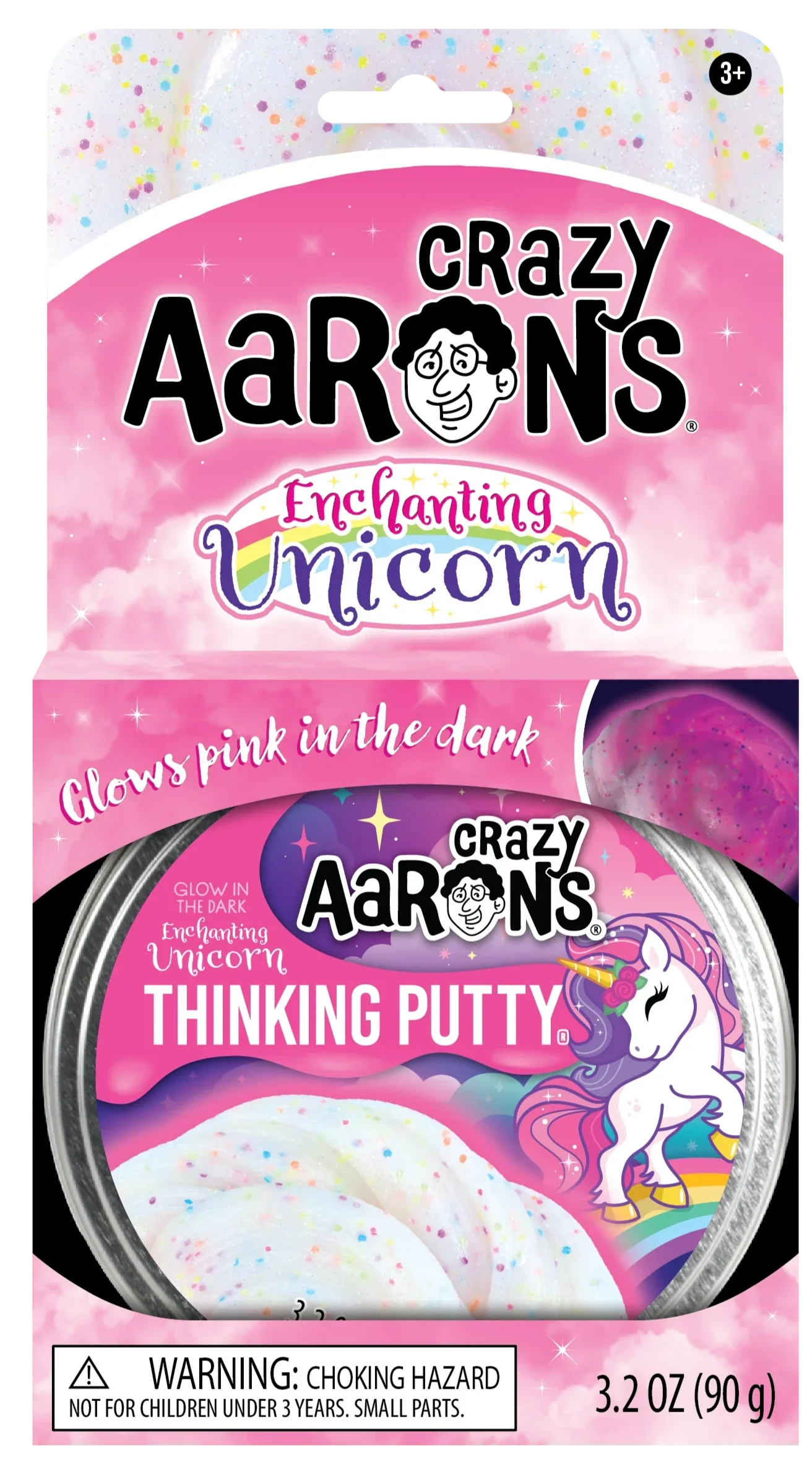 The packaging for Crazy Aaron's Thinking Putty, "Enchanting Unicorn" edition, showcases pink putty that glows in the dark and is crafted from non-toxic silicone. It includes a unicorn illustration along with a choking hazard warning. Ideal for sensory integration enthusiasts, each pack contains 3.2 oz (90 g) of putty.