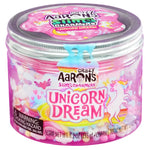 A jar of Crazy Aaron's Slime Charmers, featuring a pink label adorned with a unicorn and colorful designs, weighs 8.2 ounces and includes playful charms that boost its imaginative appeal. It comes with a choking hazard warning.