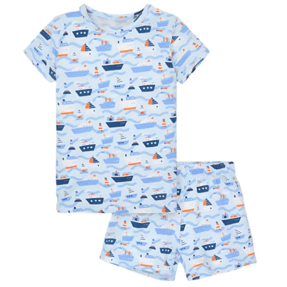 The Magnetic Me Baby Boys' and Boys' Modal No Drama S/S Short Pajama Set features soft TENCEL™ modal, matching shorts, and a blue and orange nautical boat print on a light blue background.