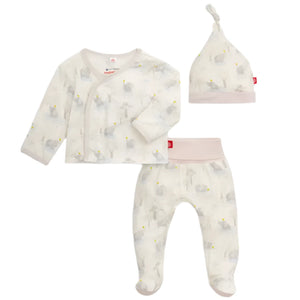 The Magnetic Me Baby Modal Kimono Set features a long-sleeve top, footed pants, and a knotted hat in soft white TENCEL™ modal with a subtle animal print.