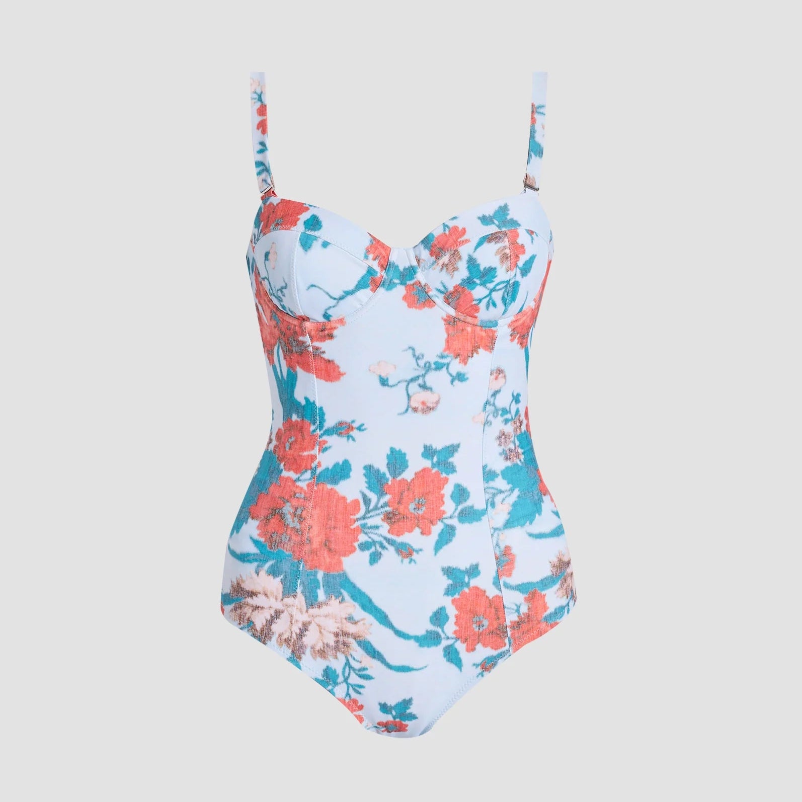 The Erdem Trailing Poppy One Piece is a blue one-piece swimsuit with moulded cups and adjustable straps, showcasing a red floral print, set against a plain light background.