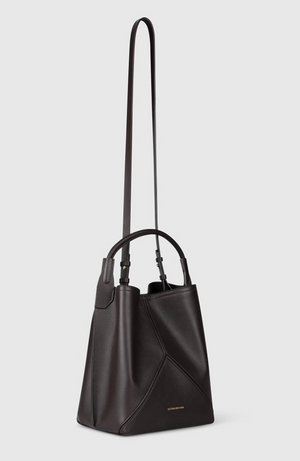 Dark tan nappa leather Victoria Bucket bag with a top handle and adjustable shoulder strap.