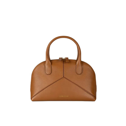 Victoria Small Doctor Bag by Victoria Beckham in brown leather with two handles, zipper closure, and minimalist design, shown on a plain white background.