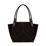 The Victoria Suede Tote by Victoria Beckham features two handles, a structured shape for laptops, and subtle gold text near the base, shown on a plain white background.