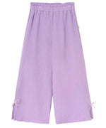 The Cozmo Girls' Violet Wide Pants are light purple cotton gauze pants with a crinkled texture, elastic waistband, and small bow accents at each leg hem.