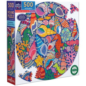 The Eeboo Seahorses, Shells & Coral 500 Round Puzzle features vibrant underwater illustrations by Monika Forsberg on the box, showcasing seahorses, shells, and coral.