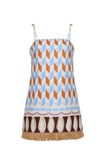 The Valencia Mini Dress by Cara Cara is a sleeveless mini shift dress with blue, brown, and beige geometric patterns, thin straps, and a raffia fringe hem.